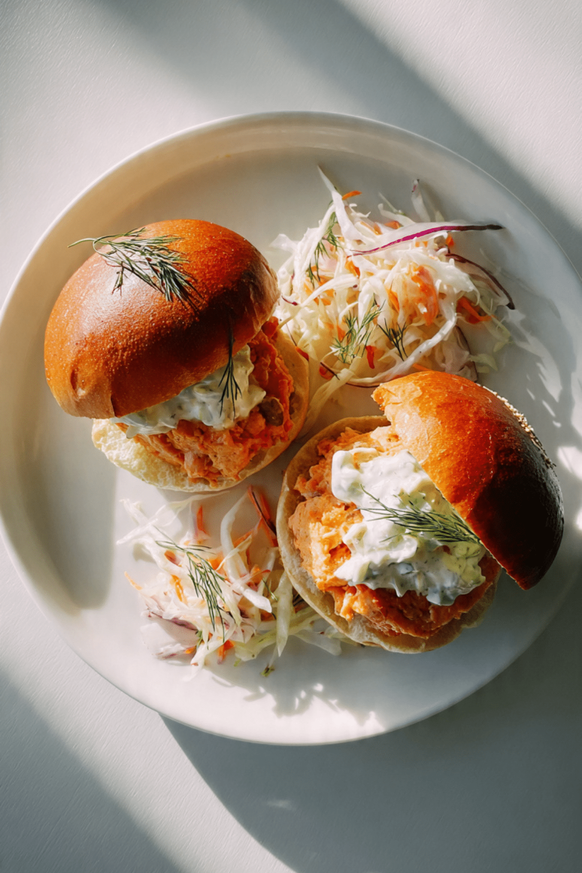 Salmon Burgers with Lemon-Caper Spread and Fennel Slaw